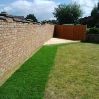 Decking and turfed over border