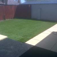After - Back Garden, Turfing and Patio. Landscaping job transformation.