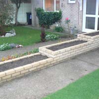 Turf for Front Garden and a Brick Raised Bed along the Pathway