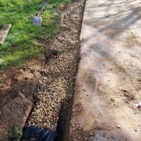 Sustainable Drainage System covered with Clean Gravel by JMC Services