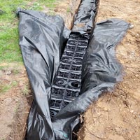 Sustainable Drainage System Hole Lined with Permeable Geo-Textile Membrane by JMC Services